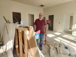 Denny Thompson inside the 2nd floor apartment above the Camelot Theater