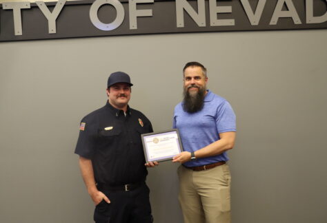 Lt. Nick Brown is pictured with Mayor Brett Barker.