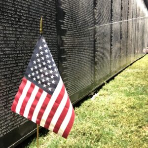 American Flag next to The Wall That Heals