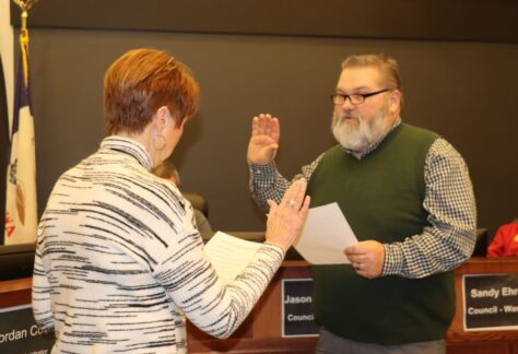 Brian Hanson takes oath of office as administered by Mayor Pro Tem Sandy Ehrig