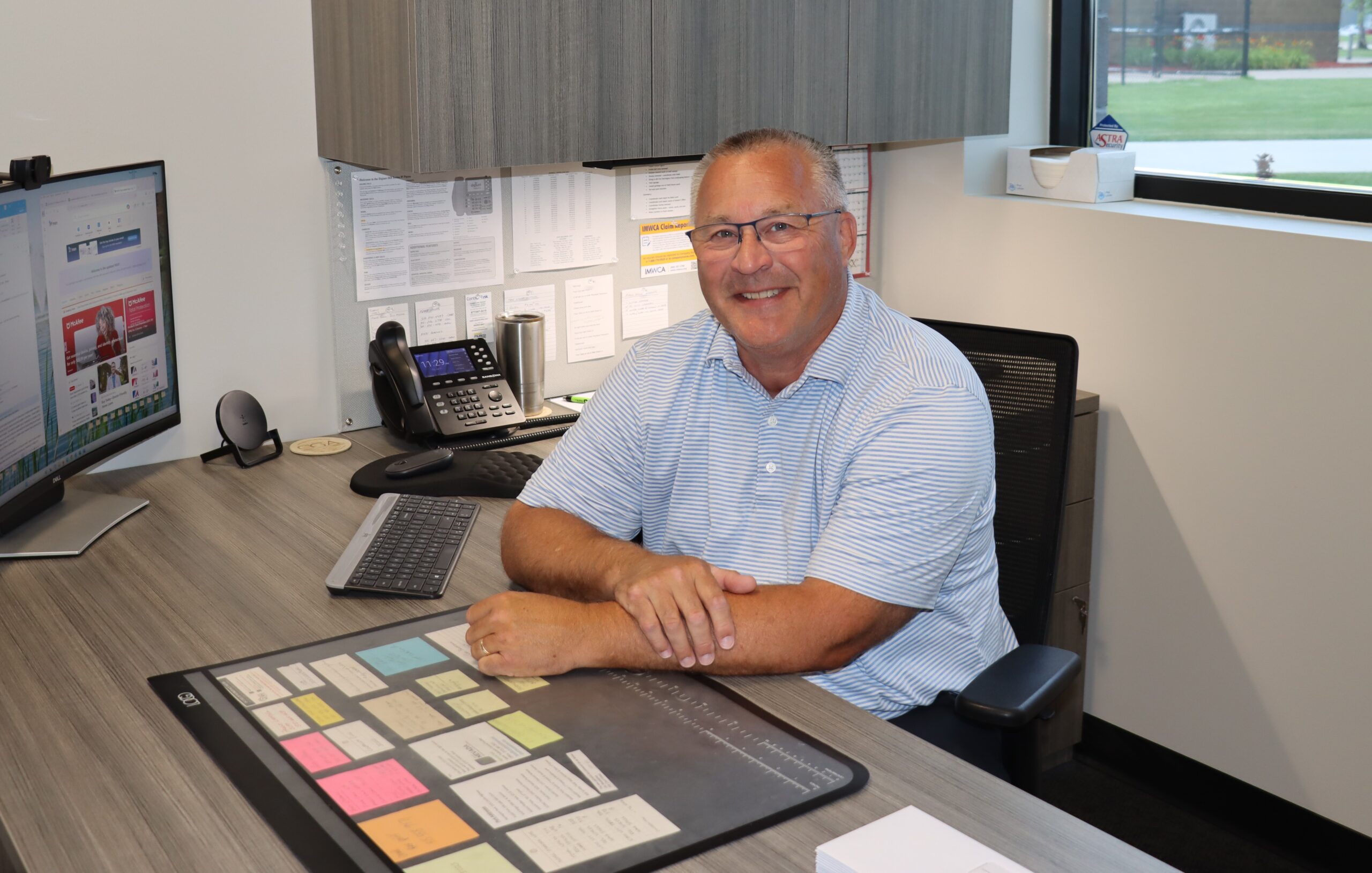 Tim Hansen sitting in his office at the Field House