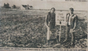 A photo of two scientists at the geographical center of Iowa in 1979.