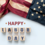 The Words "Happy Labor Day" with flag art background